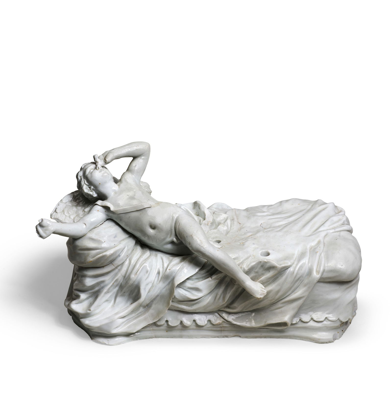 A Doccia group of Cupid and Psyche, circa 1750: A Doccia group of Cupid and Psyche, circa 1750 After the model by Giovanni Battista Foggini, the reclining Cupid stretching out his right arm, his leg just stretching over the edge of the bed, leaning