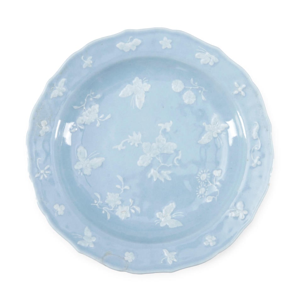 A SLIP-DECORATED CLAIR-DE-LUNE-GLAZED 'BUTTERFLY' DISH China, Qianlong period or later (1 of 2)