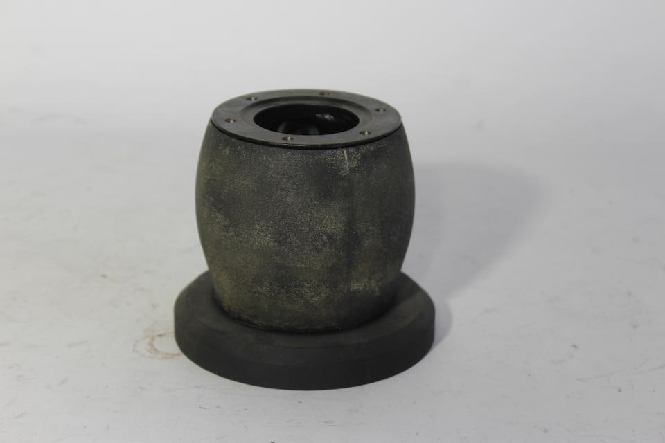 A NOS, unidentified steering wheel hub, 21MM, black vinyl,: A NOS, unidentified steering wheel hub, 21MM, black vinyl, showing signs of shelf ware. Lot to be sold without reserve. For further information on this lot please visit Bonhams.com For further informa