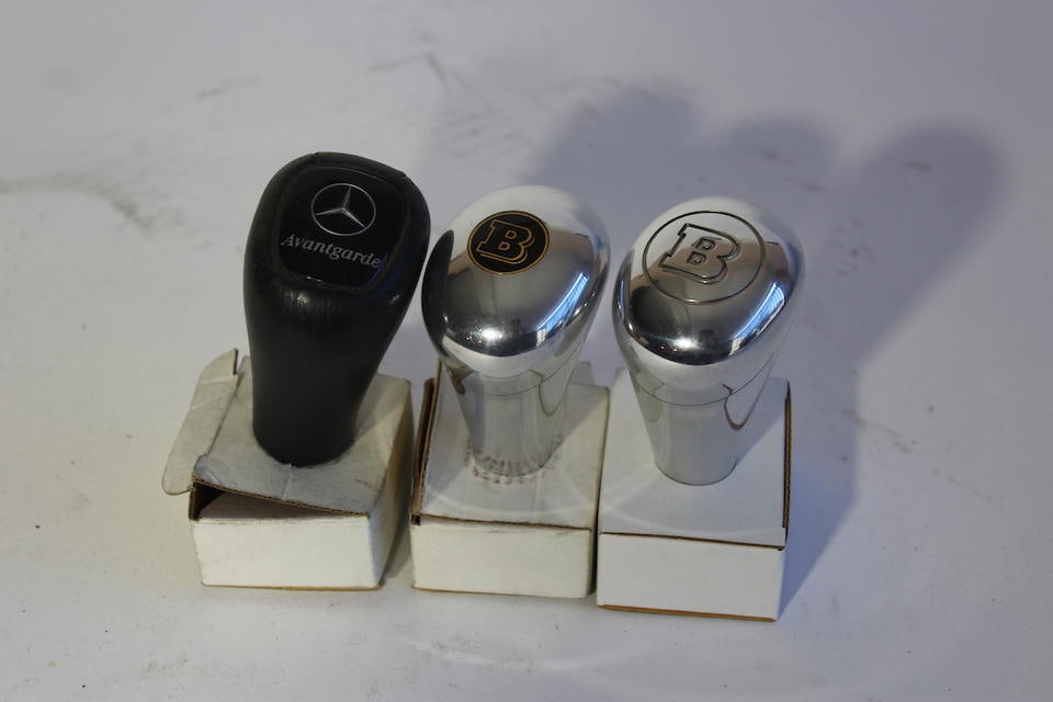 2, Brabus aftermarket shifter knobs together with other,: 2, Brabus aftermarket shifter knobs together with other, 2 Brabus and 1 Mercedes Avantgarde Lot to be sold without reserve. For further information on this lot please visit Bonhams.com For further inf