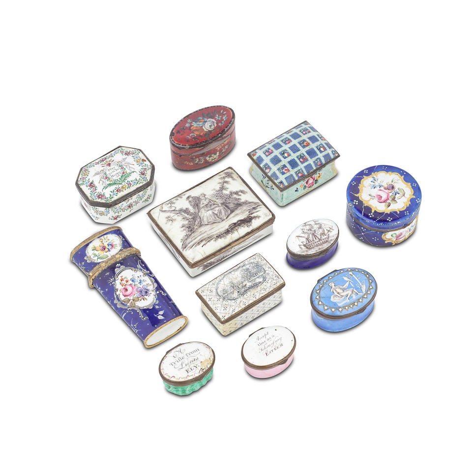 A collection of eight South Staffordshire enamel snuff and pill boxes and a similar etui case to...: A collection of eight South Staffordshire enamel snuff and pill boxes and a similar etui case together with a papier mache oval snuff box and a Samson enamel snuff box Late 18th/early 19th century and