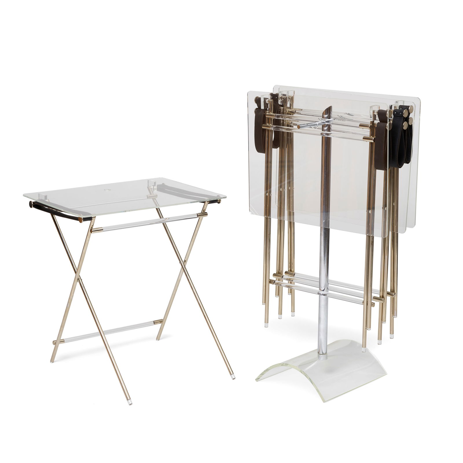 CHARLES HOLLIS JONES (BORN 1945) Set of Four Folding Tray Tables on Stand1970sacrylic, chromed m...: CHARLES HOLLIS JONES (BORN 1945) Set of Four Folding Tray Tables on Stand 1970s acrylic, chromed metal, leather height of table 23 1/2in (59.7cm); width 22in (56cm); depth 16 1/2in (42cm) Footnotes: P