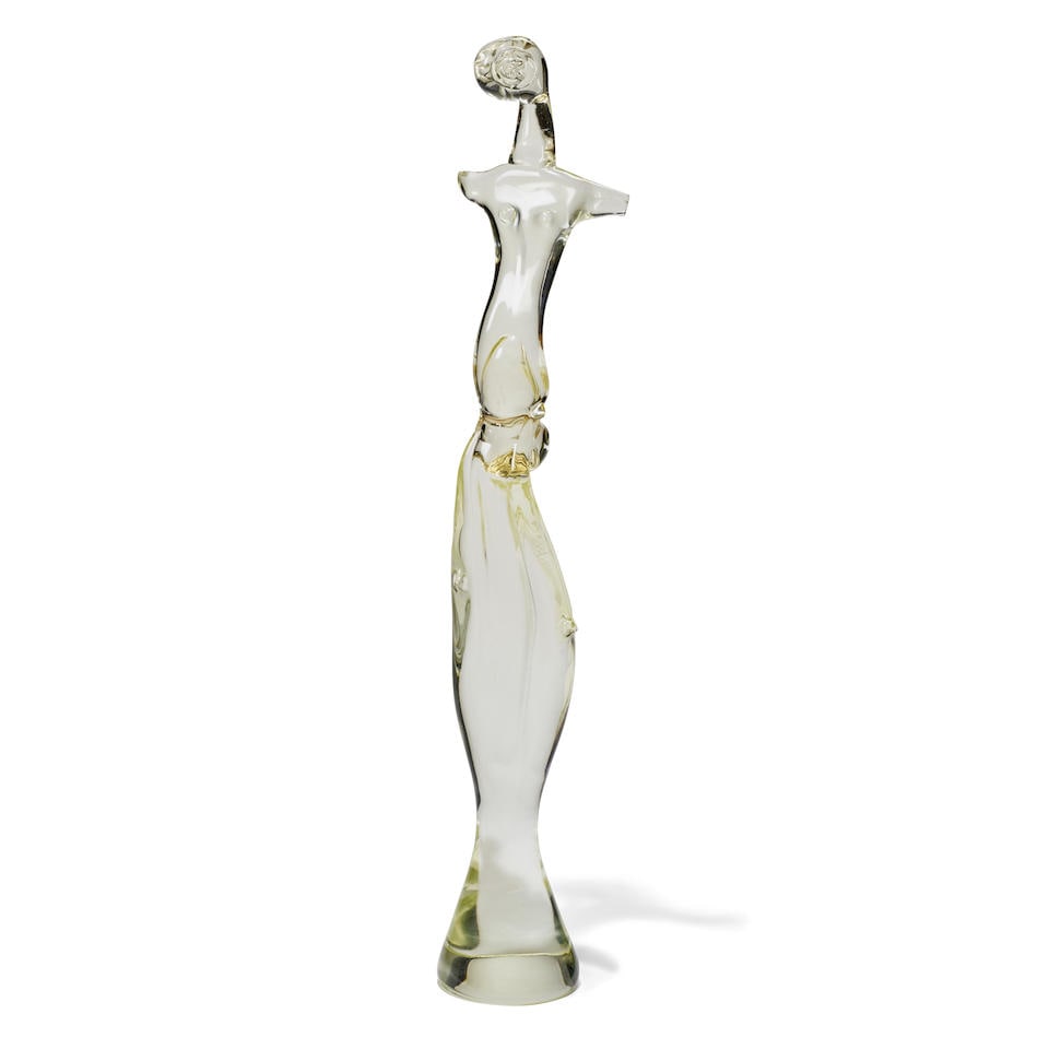 VETRERIA GINO CENEDESE (FOUNDED 1946); ATTRIBUTED TO Monumental Figure circa 1950hand formed gla...: VETRERIA GINO CENEDESE (FOUNDED 1946); ATTRIBUTED TO Monumental Figure circa 1950 hand formed glass with a straw tint length 35 1/2in (90cm); width 5in (12.5cm) Lot to be sold without reserve. For fur