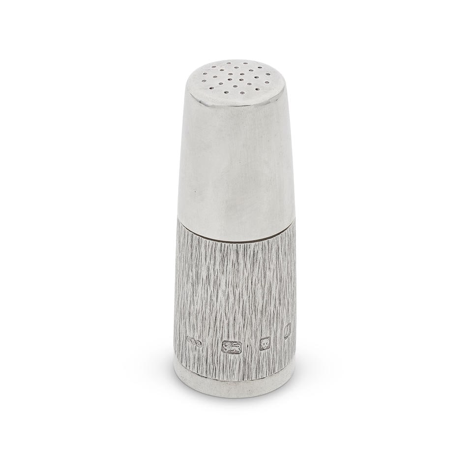 GERALD BENNEY: a silver shaker London 1966: GERALD BENNEY: a silver shaker London 1966 Of tapering conical form, polished pull-off cover, with bark-effect textured to lower body over a narrow polished base, height 10.5cm, weight 5oz. Footnotes:
