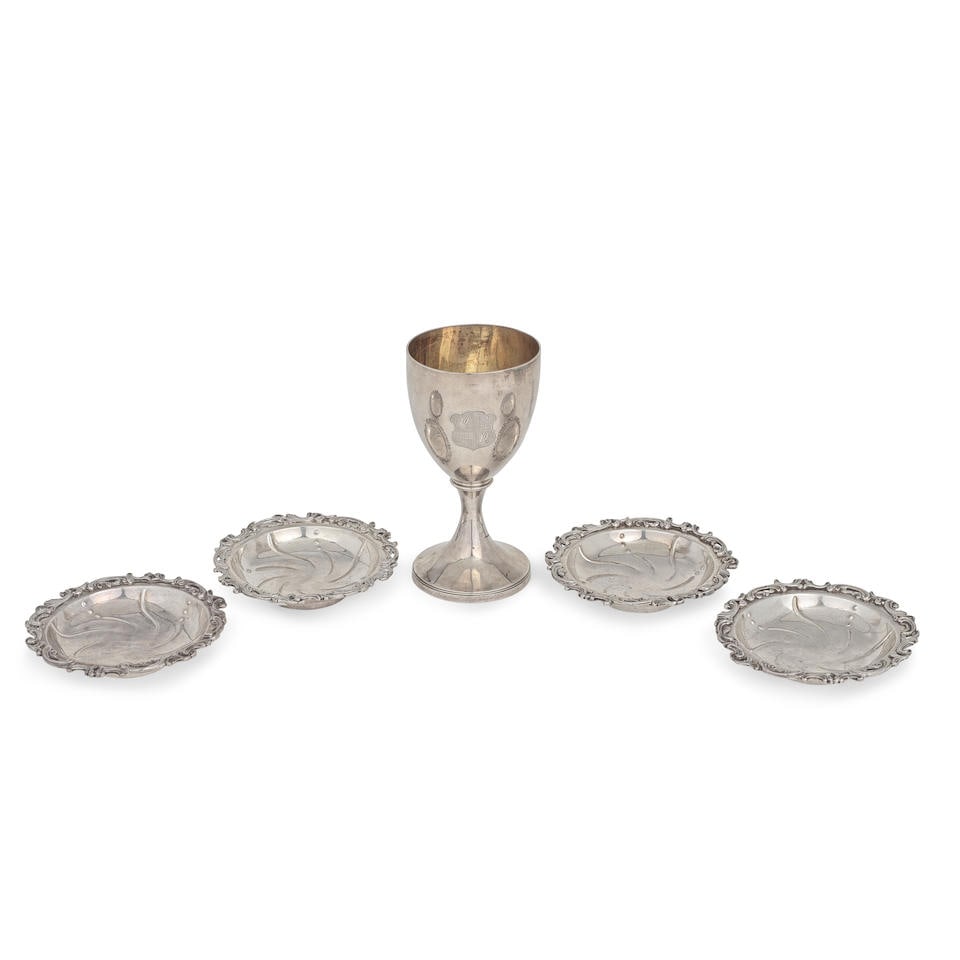 A George IV silver goblet Thomas Johnson, London 1822 (6): A George IV silver goblet Thomas Johnson, London 1822 Plain tapering bowl, with engraved armorial of the ELLEM family, on a trumpet foot, gilt interior, height 17.5oz; four George III silver nut dish