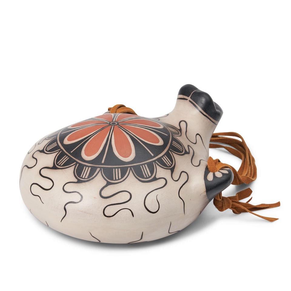 A Virgil Ortiz canteen Virgil Ortiz, Cochiti Pueblo, (b. 1969) ht. 3 3/4, wd. 6 3/4, lg. 8 in. (1 of 3)