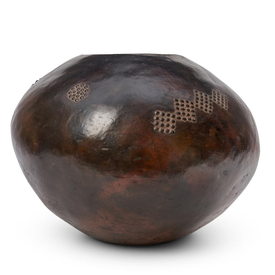 A Zulu terracotta vessel, umancishane ht. 11 3/4, wd. 13 1/2 in. (1 of 3)