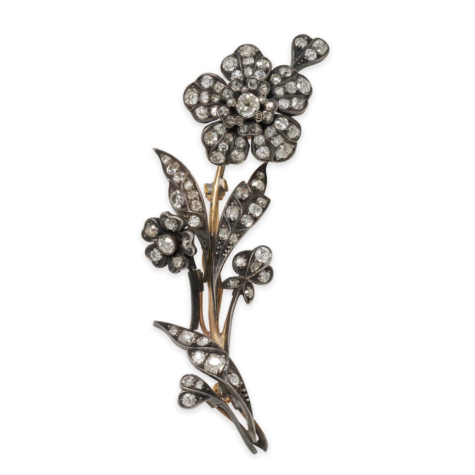 A VICTORIAN DIAMOND 'EN TREMBLANT' FLOWER BROOCH (1 of 2)