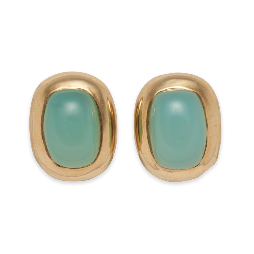 MAZ: A PAIR OF 14K GOLD AND CHALCEDONY EARCLIPS: MAZ: A PAIR OF 14K GOLD AND CHALCEDONY EARCLIPS Each centering a green chalcedony cabochon measuring approximately 14.50 x 10.50 x 7.10 mm, weight 7.6 dwt, signed MAZ, length 3/4 in. Lot to be sold