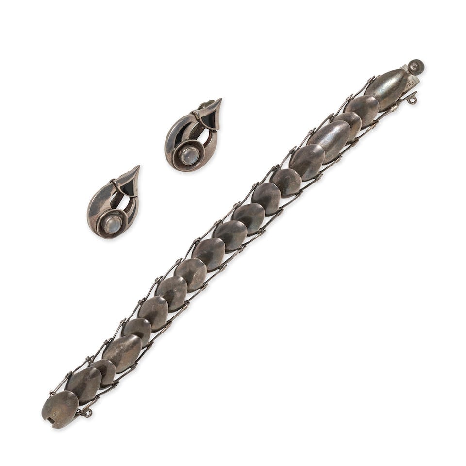 ANTONIO PINEDA: A SILVER BRACELET AND EARCLIPS (1 of 3)