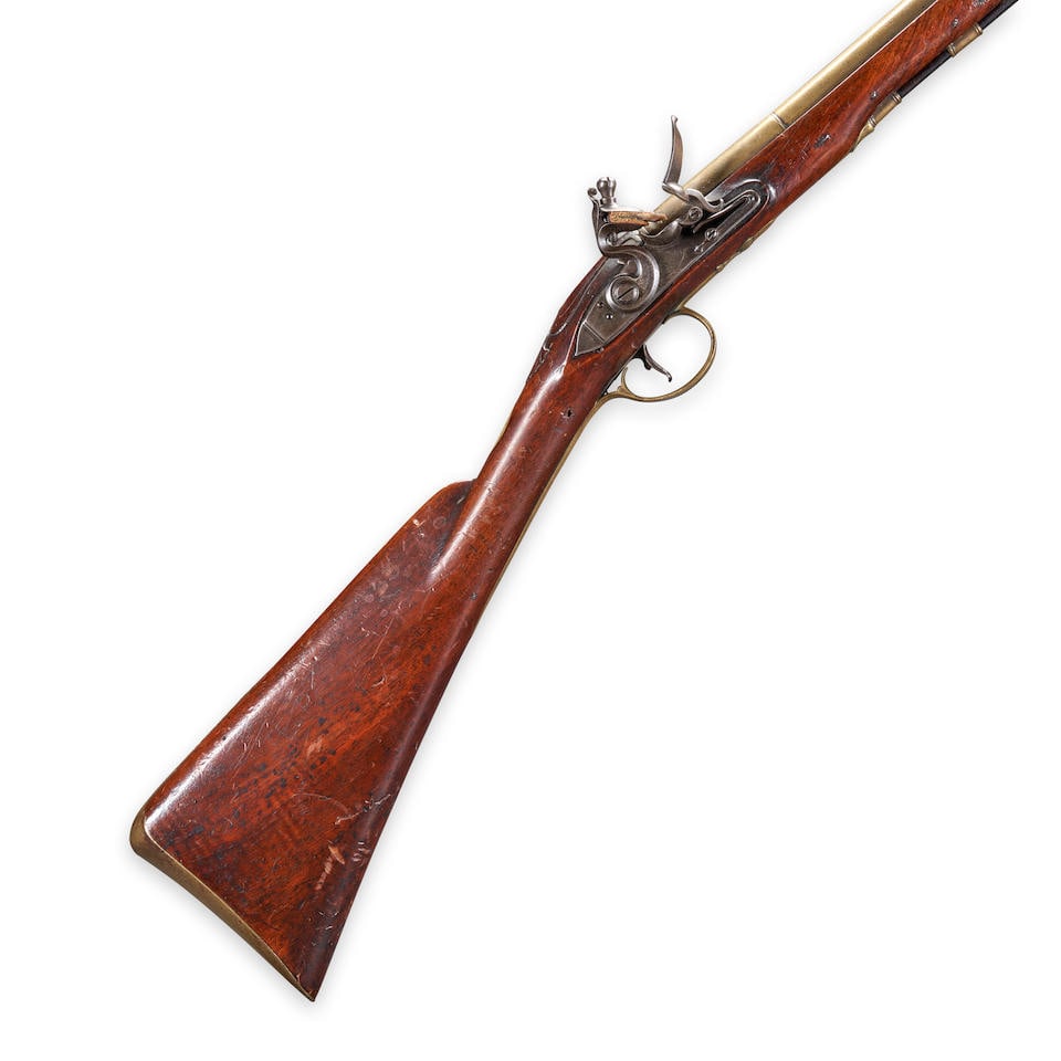 A SMALL ENGLISH BRASS BARREL FLINTLOCK BLUNDERBUSS OR MUSKETOON,: A SMALL ENGLISH BRASS BARREL FLINTLOCK BLUNDERBUSS OR MUSKETOON, by John Bennett II, London, late 18th century. 10 1/4 in. brass barrel with flaring cannon muzzle, the top of the breech engraved 'BENN