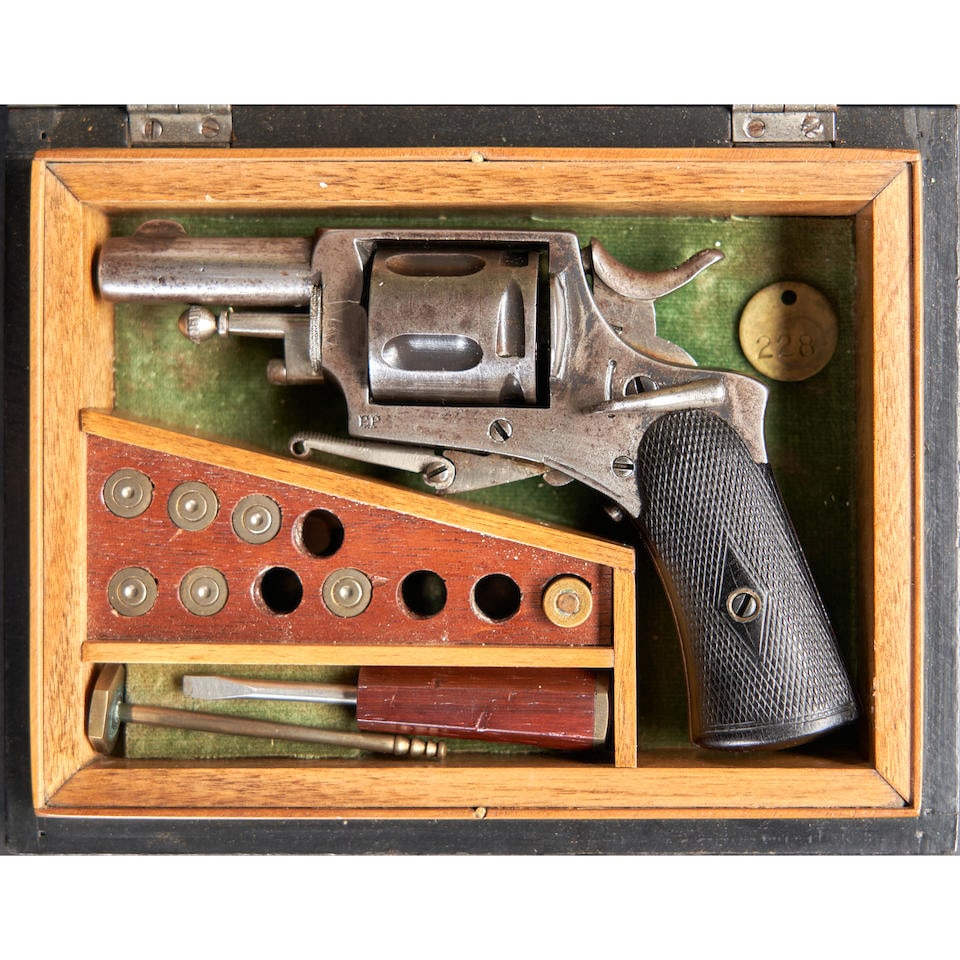 A CASED BELGIAN BROWNING FOLDING TRIGGER POCKET REVOLVER,: A CASED BELGIAN BROWNING FOLDING TRIGGER POCKET REVOLVER, 1870s. Serial number 8364, .25 caliber, round barrel with blade front sight, the frame marked crown over 'R,' lion over 'PV' and star over 'A'