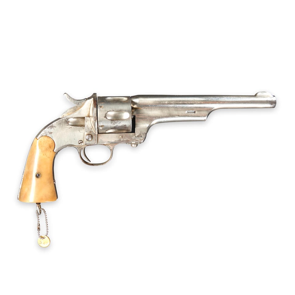 A MERWIN & HULBERT OPEN TOP SINGLE ACTION FRONTIER ARMY REVOLVER,: A MERWIN & HULBERT OPEN TOP SINGLE ACTION FRONTIER ARMY REVOLVER, 1870s. Serial number 1919, barrel sleeved to .32 caliber, nickel plated barrel and frame, the top of the barrel marked 'MERWIN HULBERT