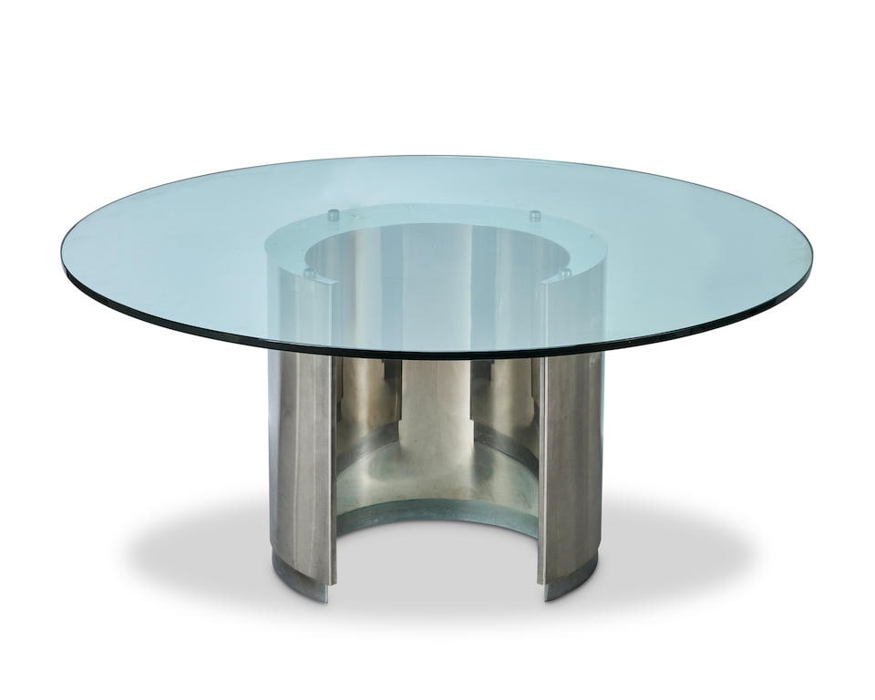 Ringo Starr and Robin Cruickshank, ROR Ltdcircular table, 1970s,: Ringo Starr and Robin Cruickshank, ROR Ltd circular table, 1970s, Brushed steel, chromium-plated steel, glass 70 x 153cm (27 1/2 x 60in). Footnotes: ROR (Ringo or Robin) Ltd was founded in 1969 by Rin
