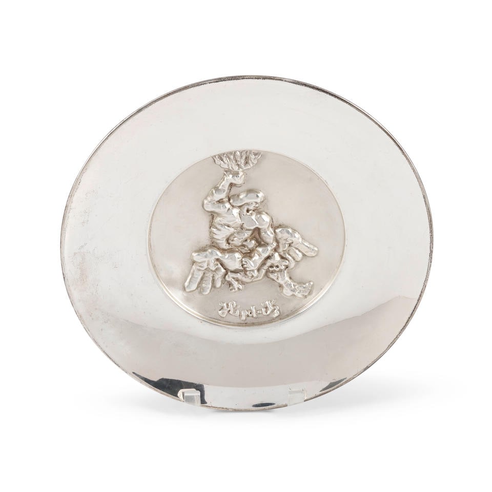 JACQUES LIPCHITZ 'THE STRUGGLE' STERLING SILVER PLATE: JACQUES LIPCHITZ 'THE STRUGGLE' STERLING SILVER PLATE published by The Liberty Mint in 1973, reg. 2184, mounted on a bronze base, dia. 11 3/4 in.. Footnotes: OVERALL CONDITION: Good. Tarnish, scratch