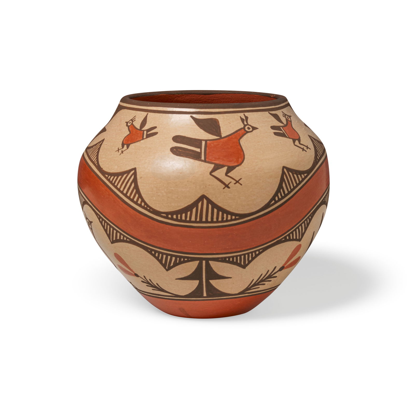 An Elizabeth Medina jar: Elizabeth Medina Zia Pueblo, (b. 1956), a four-color polychrome pottery jar worked with birds and rainbows, signed near the base. height 7 1/4in, diameter 8 1/8in Footnotes: Provenance Per the collect