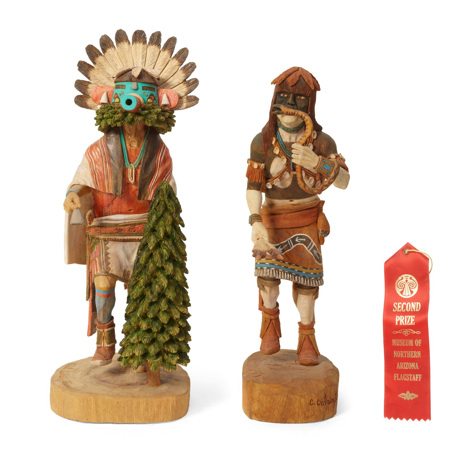 Two Cecil Calnimptewa figural carvings (1 of 2)