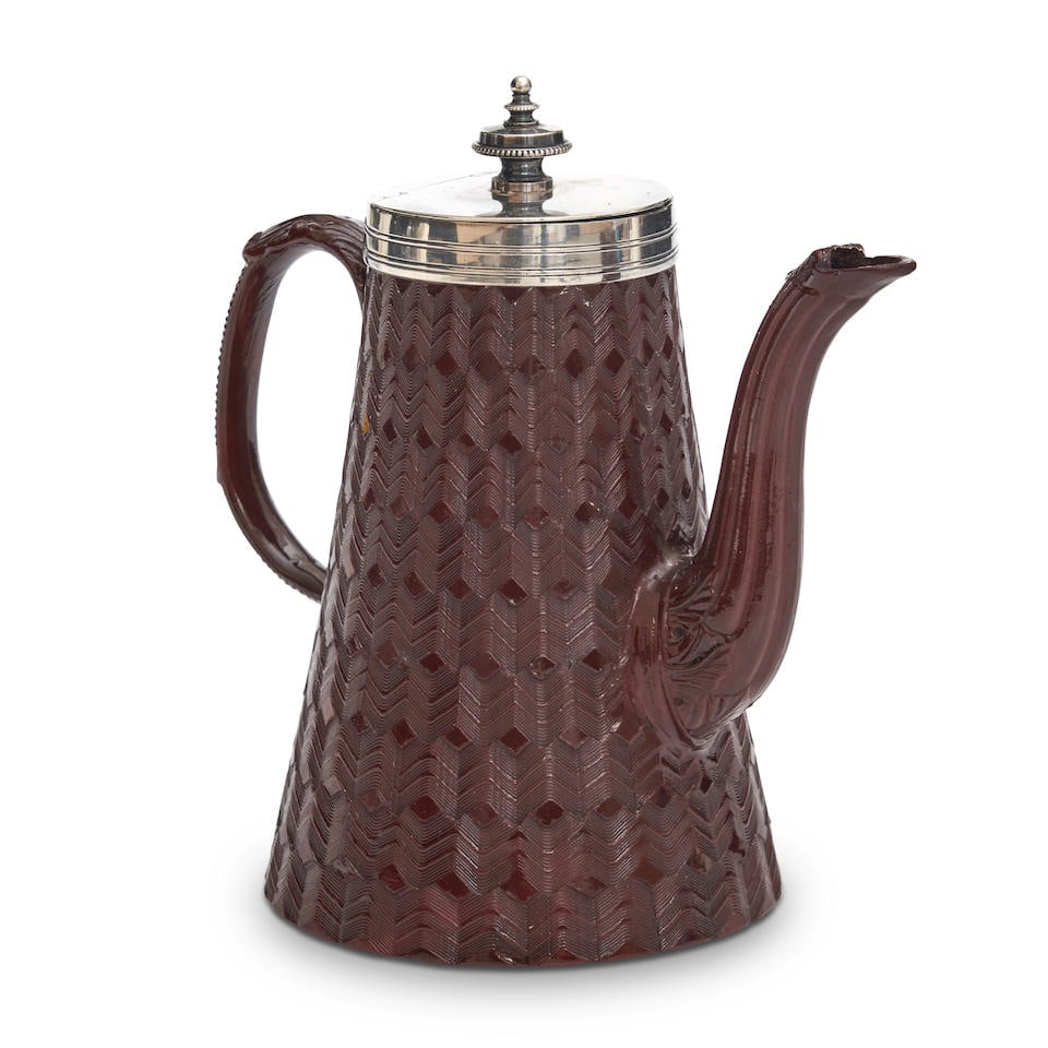 Staffordshire Glazed Redware Coffee Pot, England, mid 18th century,: Staffordshire Glazed Redware Coffee Pot, England, mid 18th century, engine turned lighthouse shape with hinged silver lid, ht. 6 1/2 in. For further information on this lot please visit Bonhams.com Fo