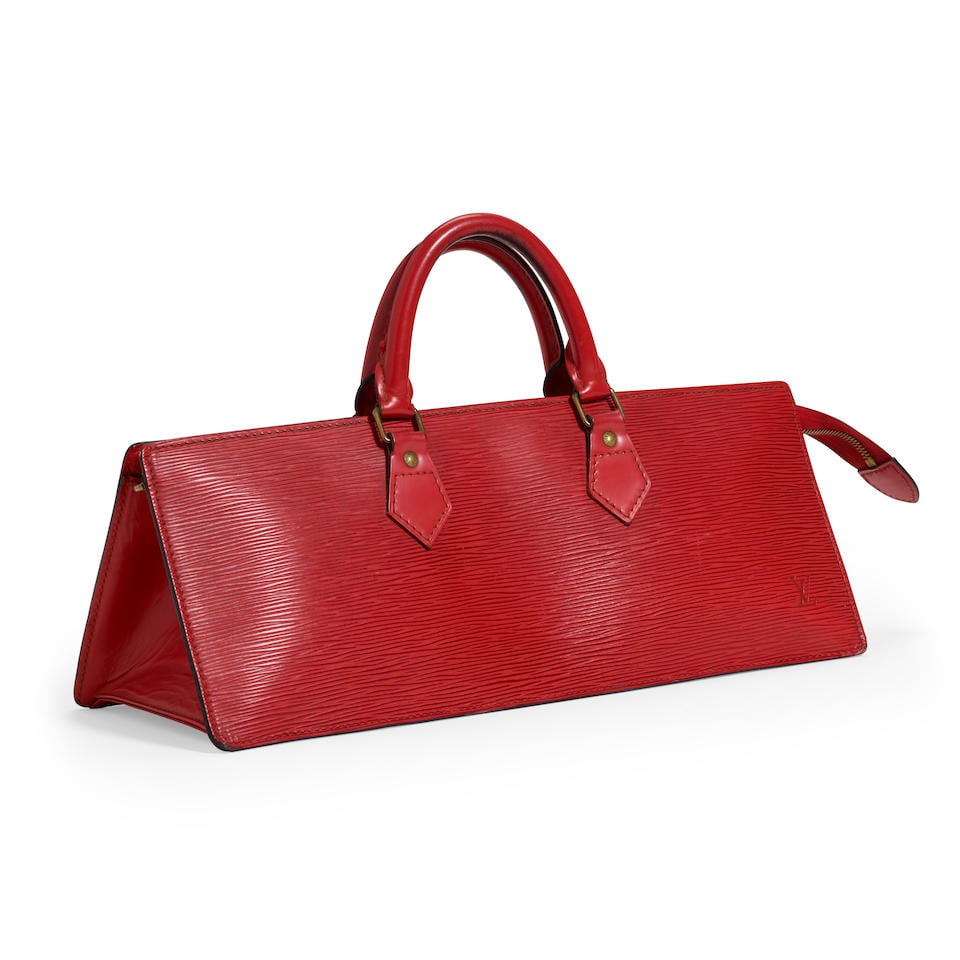 LOUIS VUITTON: EPI SAC TRIANGLE 1992: LOUIS VUITTON: EPI SAC TRIANGLE 1992 • Red Epi Leather Exterior • Brass Hardware • Rolled Leather Handles • Zip Closure • Black Leather Lined Interior • Interior Zi