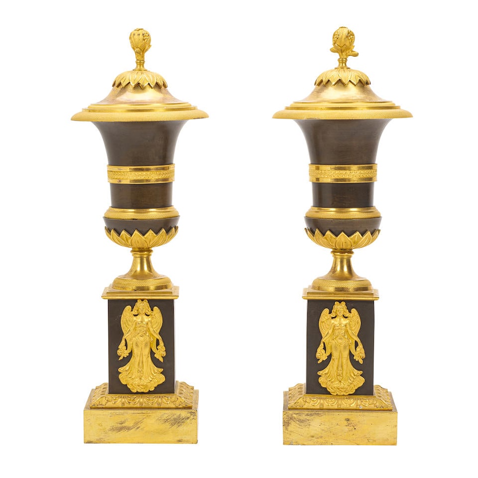 A PAIR OF EMPIRE GILT AND PATINATED BRONZE CASSOLETTESEarly 19th century: A PAIR OF EMPIRE GILT AND PATINATED BRONZE CASSOLETTES Early 19th century height 14 1/2in (37cm) Footnotes: Condition reports are not provided in catalog descriptions. The absence of a condition repor