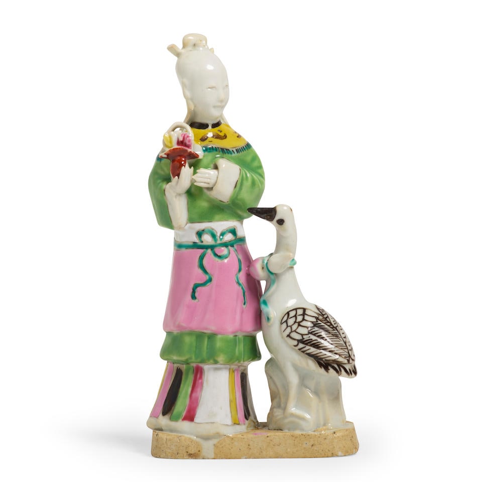 A CHINESE EXPORT FAMILLE ROSE FIGURE OF A GIRL WITH A CRANEQianlong period (1736-1795): A CHINESE EXPORT FAMILLE ROSE FIGURE OF A GIRL WITH A CRANE Qianlong period (1736-1795) height 7in (18cm) Footnotes: Provenance Solveig & Anita Gray, London; Acquired form the above 14 June 1996. Cond