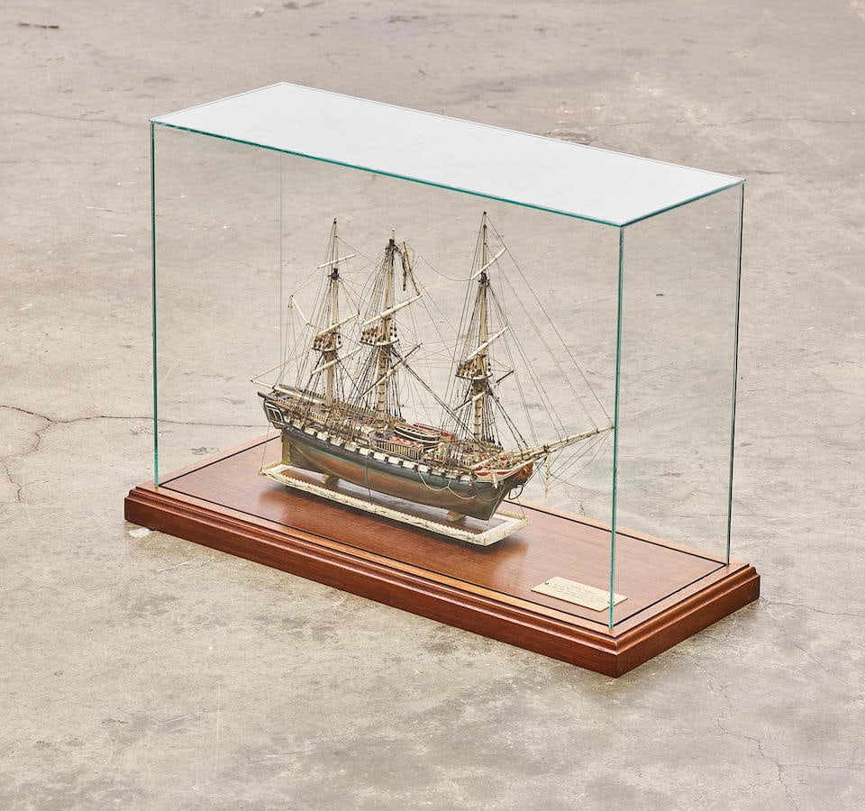 A NAPOLEONIC PRISONER-OF WAR STYLE POLYCHROME SHIP MODEL OF THE 74-GUN FRIGATE HMS MARSCirca 1930: A NAPOLEONIC PRISONER-OF WAR STYLE POLYCHROME SHIP MODEL OF THE 74-GUN FRIGATE HMS MARS Circa 1930 In a glass and stained wood case and plaque inscribed HMS Mars / Royal Navy Frigate of 1795 / model b