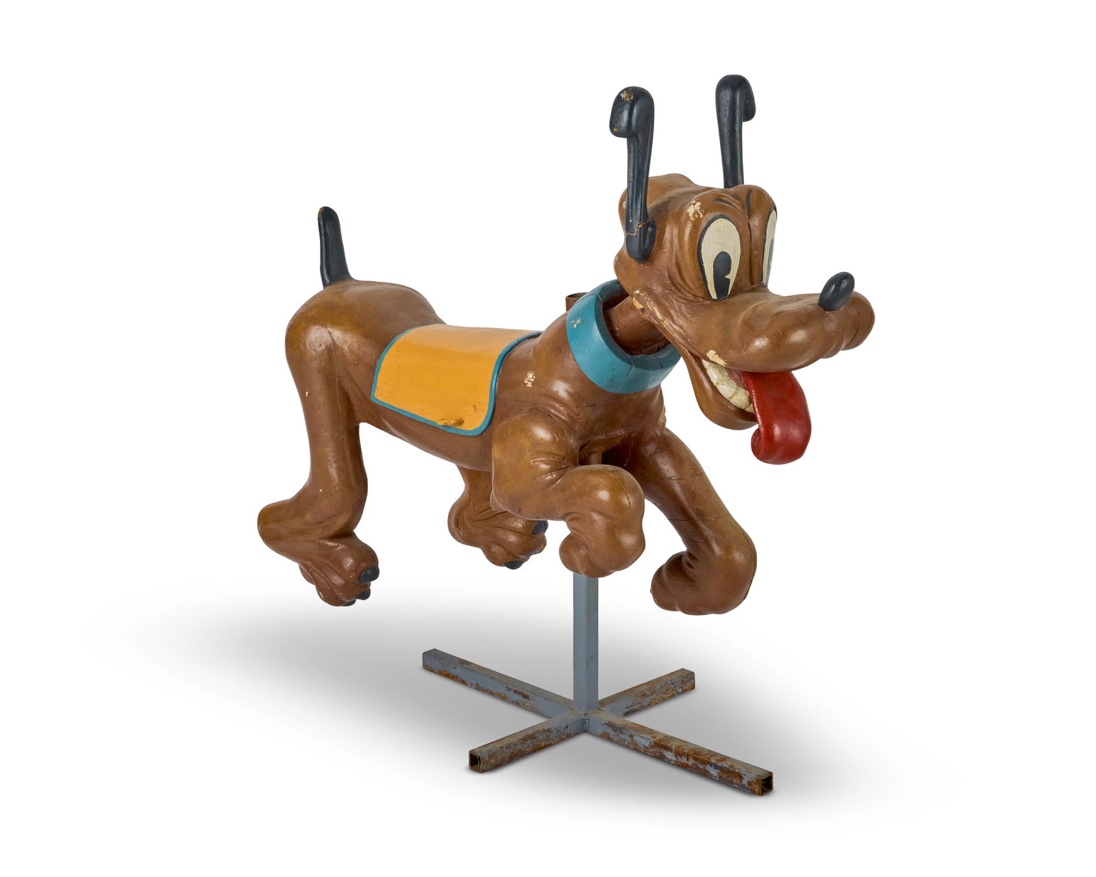 A French carved and painted juvenile carousel ride figure of Pluto Attributed to Henri De Vos, c...: A French carved and painted juvenile carousel ride figure of Pluto Attributed to Henri De Vos, circa 1930s The character in leaping position, with ears alert and tongue sticking out, mounted on a late