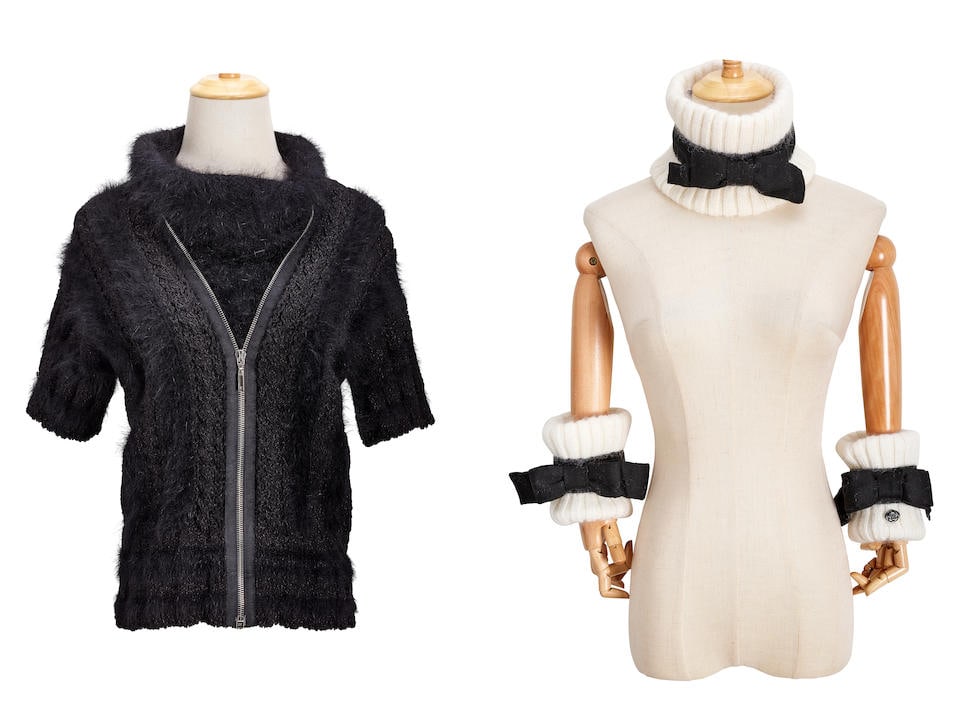 CHANEL: BLACK ANGORA ZIP FRONT SHORT SLEEVE TURTLENECK SWEATER; WHITE AND BLACK CASHMERE MOHAIR ...: CHANEL: BLACK ANGORA ZIP FRONT SHORT SLEEVE TURTLENECK SWEATER; WHITE AND BLACK CASHMERE MOHAIR NECK AND ARM WARMER WITH RIBBON SET Includes replacement button, thread swatch fabric Footnotes: 香