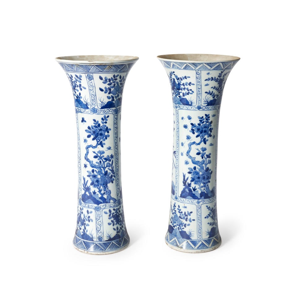 PAIR OF BLUE AND WHITE SLEEVE VASES: PAIR OF BLUE AND WHITE SLEEVE VASES China, 19th/20th century, with flared mouths and bases, the cylindrical body with rectangular cartouches of flowering branches and bamboo and smaller cartouches con