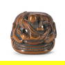 A WOOD NETSUKE OF A CARVER ON A NOH MASK Edo period, 19th century