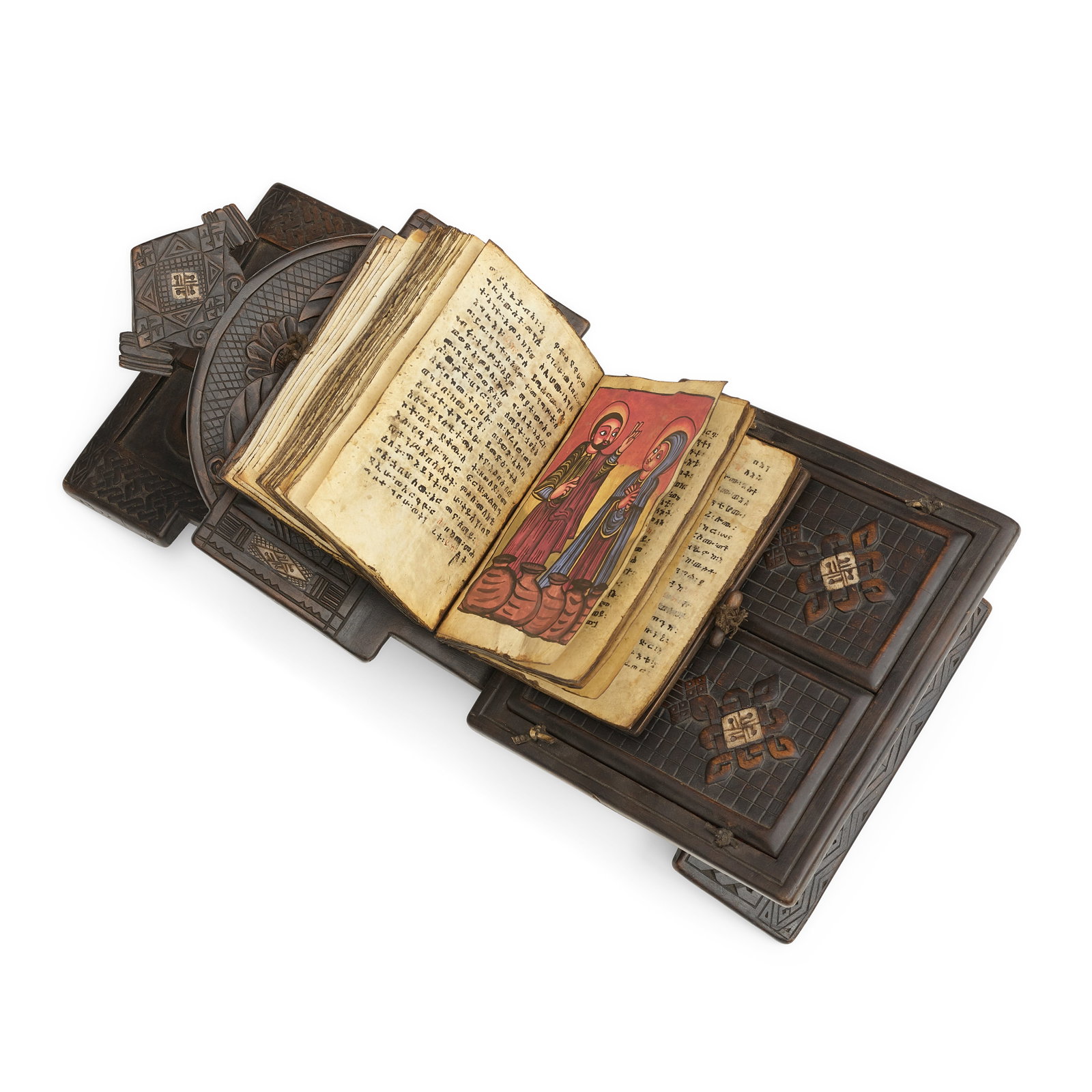 [ETHIOPIA]. PRAYER BOOK. An Ethiopian manuscript Orthodox prayer book, the text in Ge'ez script ...: [ETHIOPIA]. PRAYER BOOK. An Ethiopian manuscript Orthodox prayer book, the text in Ge'ez script written in black and red ink, on parchment, 5 ⅝ x 7 ⅜, 169pp., with 3 painted illustrations 