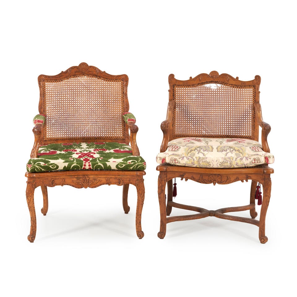 TWO LOUIS XV WALNUT AND CANED FAUTEUILS, France, 18th century, (1 of 1)