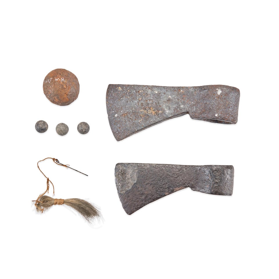 COLLECTION OF RELICS AND GUN TOOL.: COLLECTION OF RELICS AND GUN TOOL. 18th/early 19th century. Including two forged axe heads allegedly from the Lake Champlain/Fort Ticonderoga area, a small cannon ball inscribed 'FORT W.H.' three musk