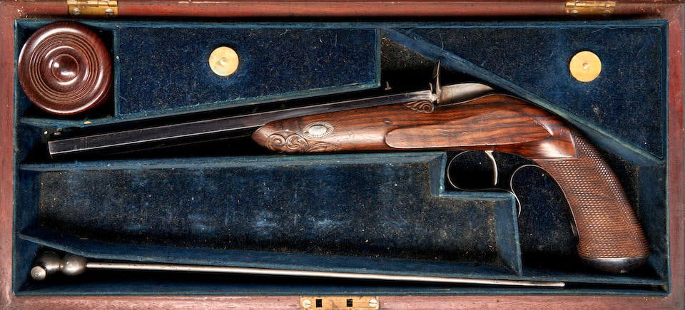 A CASED FLOBERT SALOON PISTOL,: A CASED FLOBERT SALOON PISTOL, by William Moore & Company, London, England, 1854-72. 9 1/2 in., .22 caliber blued octagon barrel engraved on the top 'W. MOORE & Co. 43 OLD BOND ST. LONDON.'; hard wood