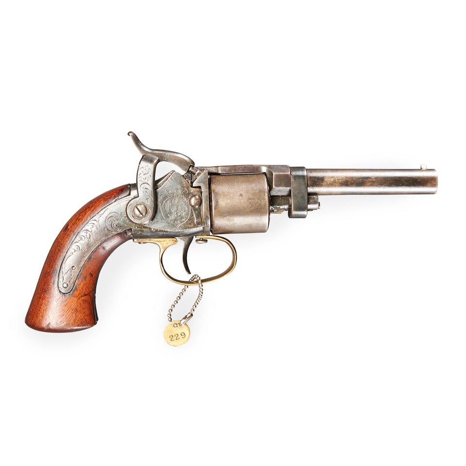 AN ENGRAVED MASSACHUSETTS ARMS COMPANY MAYNARD PRIMED POCKET REVOLVER,: AN ENGRAVED MASSACHUSETTS ARMS COMPANY MAYNARD PRIMED POCKET REVOLVER, 1851-60. Serial number 504, 4 in., .28 caliber, round barrel, the cylinder strap marked 'MASS. ARMS CO/CHICOPEE FALLS' plain cyli