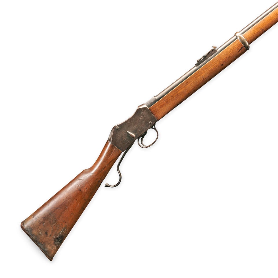 A SHORT LEVER ENFIELD MARTINI-HENRY INFANTRY RIFLE, MK III,: A SHORT LEVER ENFIELD MARTINI-HENRY INFANTRY RIFLE, MK III, 1882. 33 in., .45 caliber barrel with rear sight adjustable to 400 yards, the left side with numerous inspector marks; receiver marked on th
