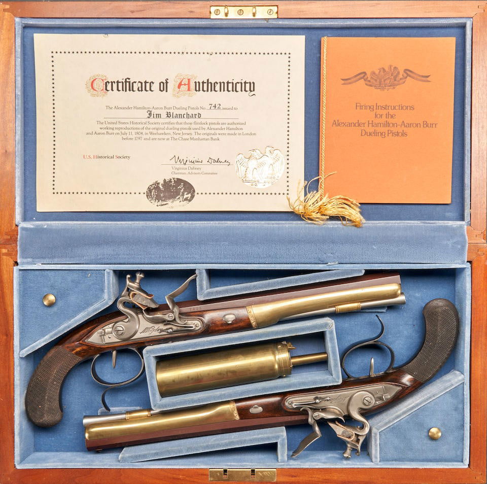 A CASED PAIR OF REPRODUCTION FLINTLOCK ALEXANDER HAMILTON AND AARON BURR DUELLING PISTOLS, (1 of 3)