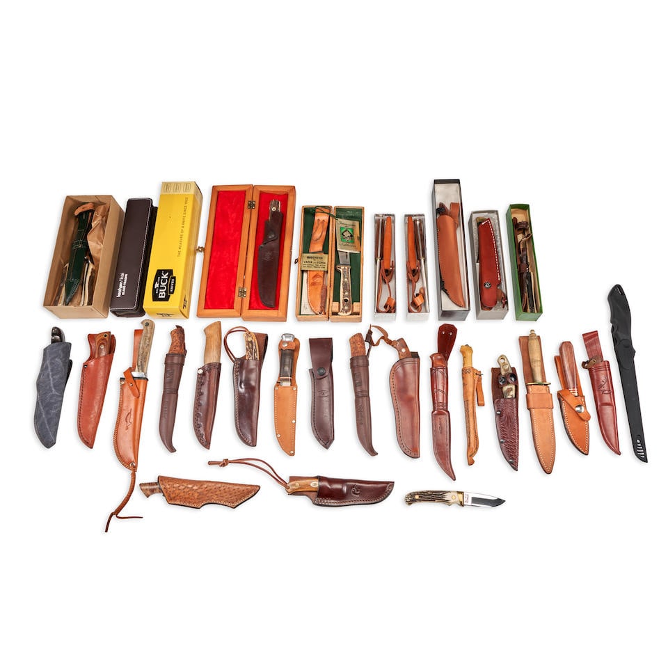 A COLLECTION OF THIRTY-ONE UTILITY/SHEATH KNIVES. (1 of 1)