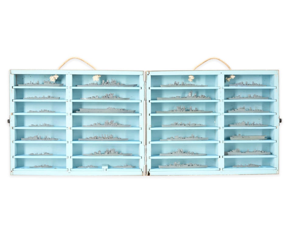 A CASED SET OF WORLD WAR II U.S. NAVY BRITISH SHIP IDENTIFICATION MODLES.: A CASED SET OF WORLD WAR II U.S. NAVY BRITISH SHIP IDENTIFICATION MODLES. The gray-painted case marked on the top 'U.S. NAVY MINIATURE BRITISH SHIP MODELS' containing twenty-nine vessels. Open case wd