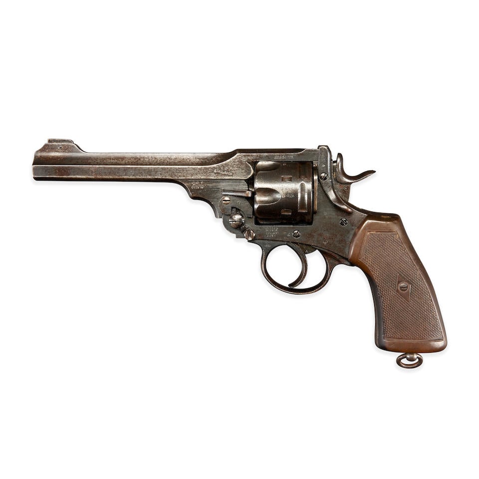 A BRITISH WEBLEY MARK VI DOUBLE ACTION REVOLVER, Curio or Relic firearm: A BRITISH WEBLEY MARK VI DOUBLE ACTION REVOLVER, Serial number 321055, .455 caliber, blued steel barrel, cylinder and frame with numerous inspector's marks, and import mark on the barrel, checkered da