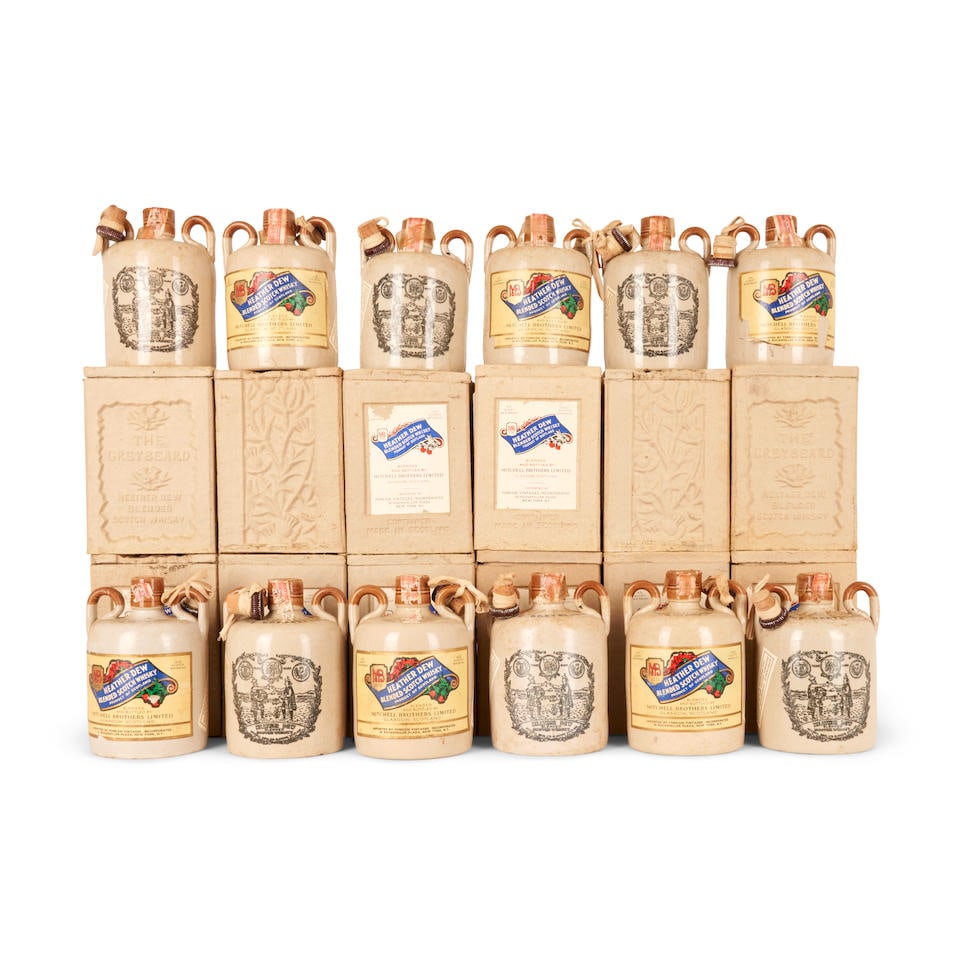 Heather Dew The Greybeard (12 4/5qt bottles): Heather Dew The Greybeard (12 4/5qt bottles) Scotland official bottling, 1x wear and losses to tax strip, 4x tearing to labels, wire bands around owc cut by specialist 4/5qt 43.4% 12 bottles (12x indi