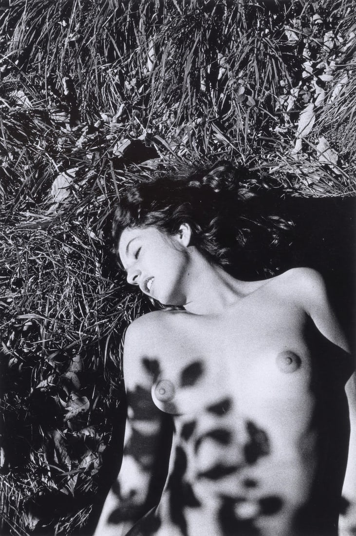 Ralph Gibson (born 1939); Nude on Grass;: Ralph Gibson (born 1939) Nude on Grass, 1969 Gelatin silver print; signed, dated, and editioned 'AP' in pencil and the photographer's '331 West Broadway, New York, N.Y. 10013' studio stamp on the reve