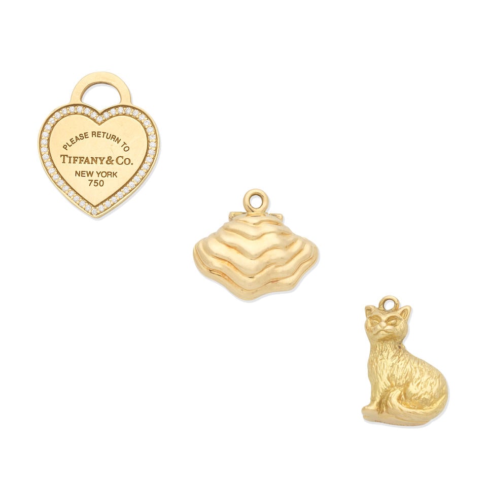 TWO TIFFANY CHARMS, AND AN OYSTER SHELL CHARM (3) (1 of 2)