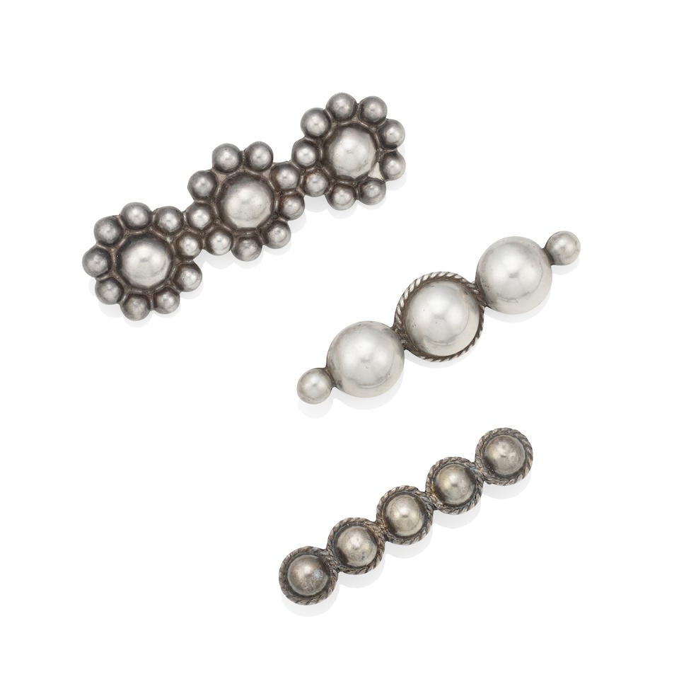 THREE STERLING SILVER BAR BROOCHES: THREE STERLING SILVER BAR BROOCHES • Sterling silver bar brooch, length 2 3/8 in. • Sterling silver bar brooch, length 1 7/8 in. • Sterling silver bar brooch, length 2 ¼ in. 