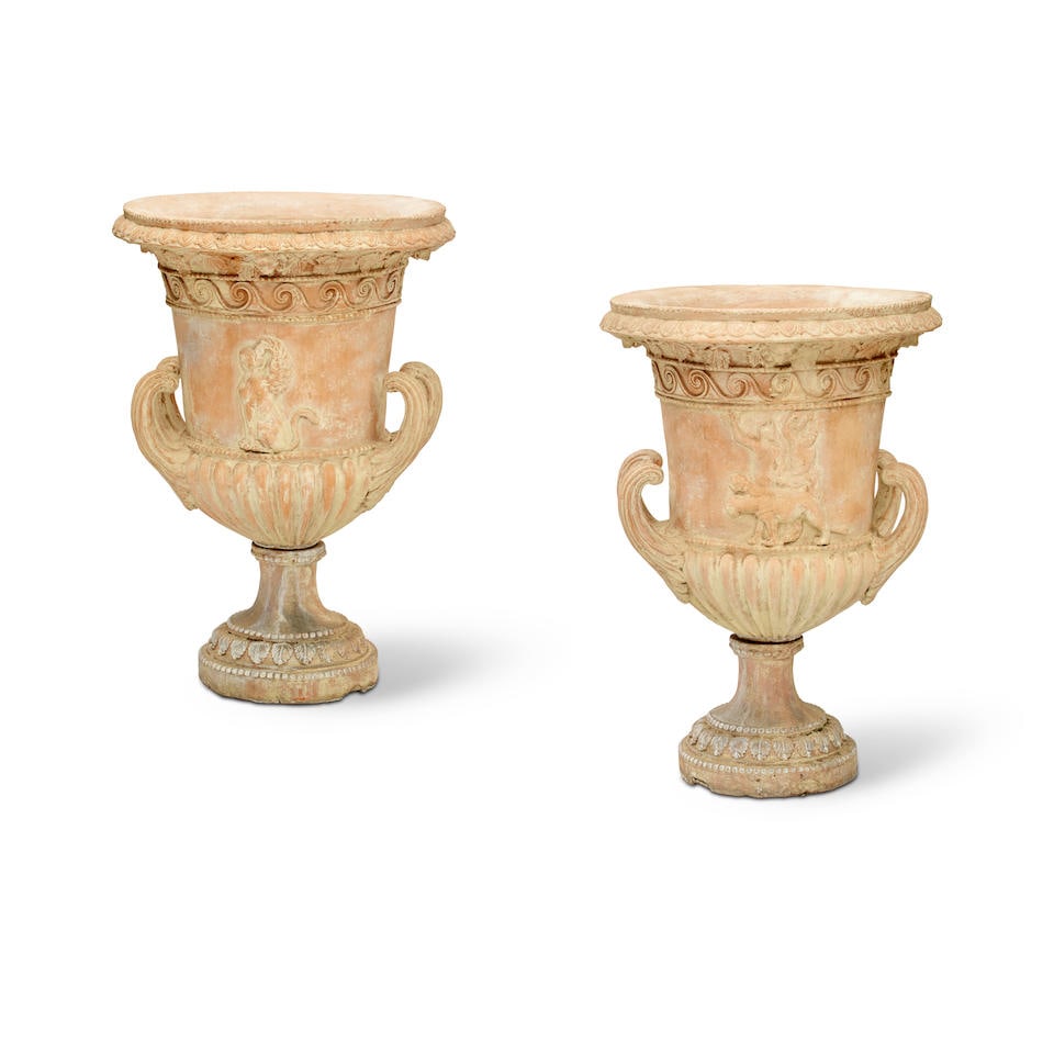 A PAIR OF TERRACOTTA URNS: A PAIR OF TERRACOTTA URNS height of both 40in (101.8cm) Footnotes: From a Donna Livingston designed Wilshire penthouse. Condition reports are not provided in catalog descriptions. The absence of a con
