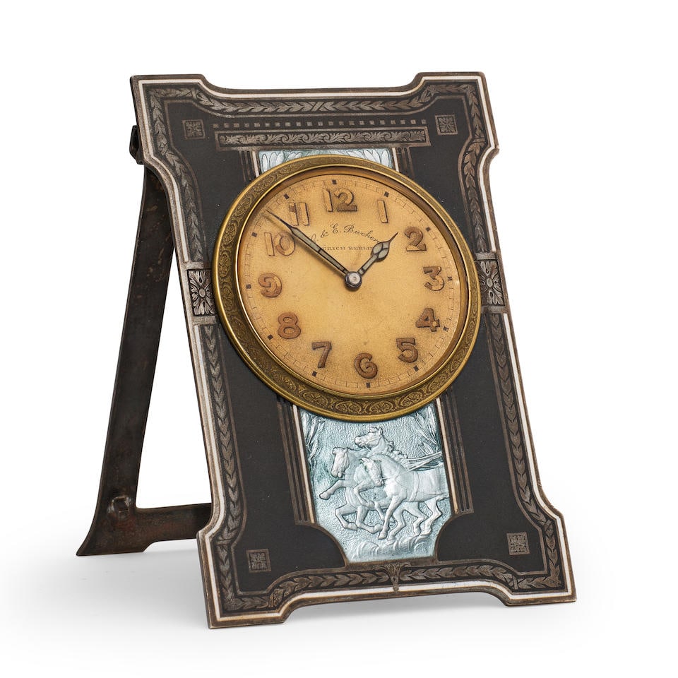 A good early 20th century silver niello and enamel decorated Swiss strut timepiece C.& E. Buche...: A good early 20th century silver niello and enamel decorated Swiss strut timepiece C.& E. Bucherer, Zurich, Berlin. The case numbered 2887/28465. the shaped frame with inlaid harebell and white enamel