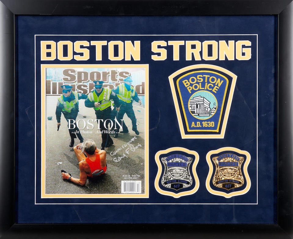 'Boston Strong' Boston Police Commemorative Display: 'Boston Strong' Boston Police Commemorative Display including Boston police patch, Ed Davis signed Sports Illustrated cover, two Boston police 'Boston Strong' badges, framed, 40cm wide, 33cm high (16i