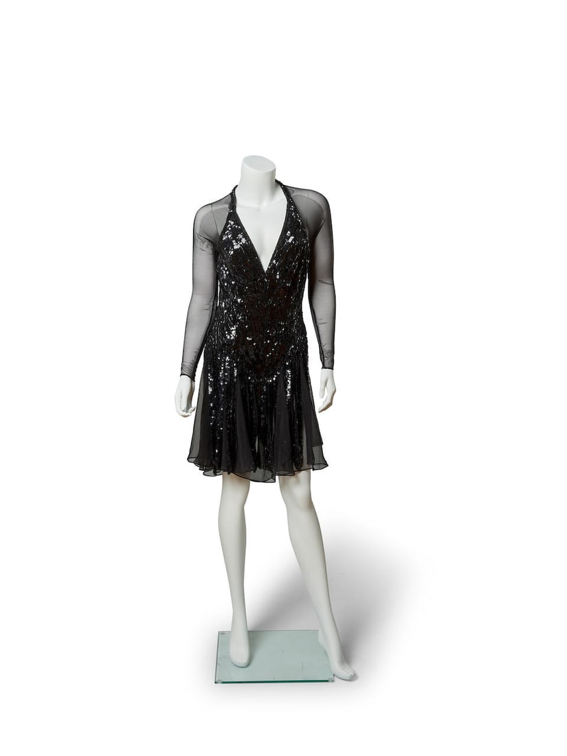 A Chita Rivera Performance Dress from Chita & All That Jazz: A Chita Rivera Performance Dress from Chita & All That Jazz Custom black dress sequin embellishments throughout. Harkening back to her years in Broadway's Chicago and the famous song with which she is