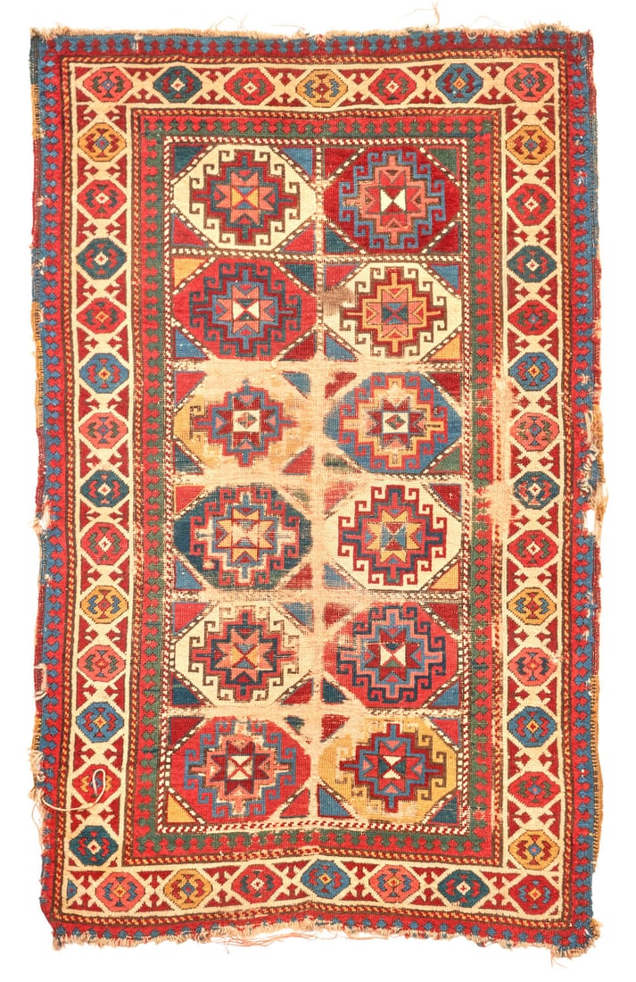 Caucasian Rug with Memling Guls Caucasus 3 ft. 6 in. x 5 ft. 5 in.: Caucasian Rug with Memling Guls Caucasus c. 19th century Provenance: The Jim Dixon Collection 3 ft. 6 in. x 5 ft. 5 in. For further information on this lot please visit Bonhams.com For further informa