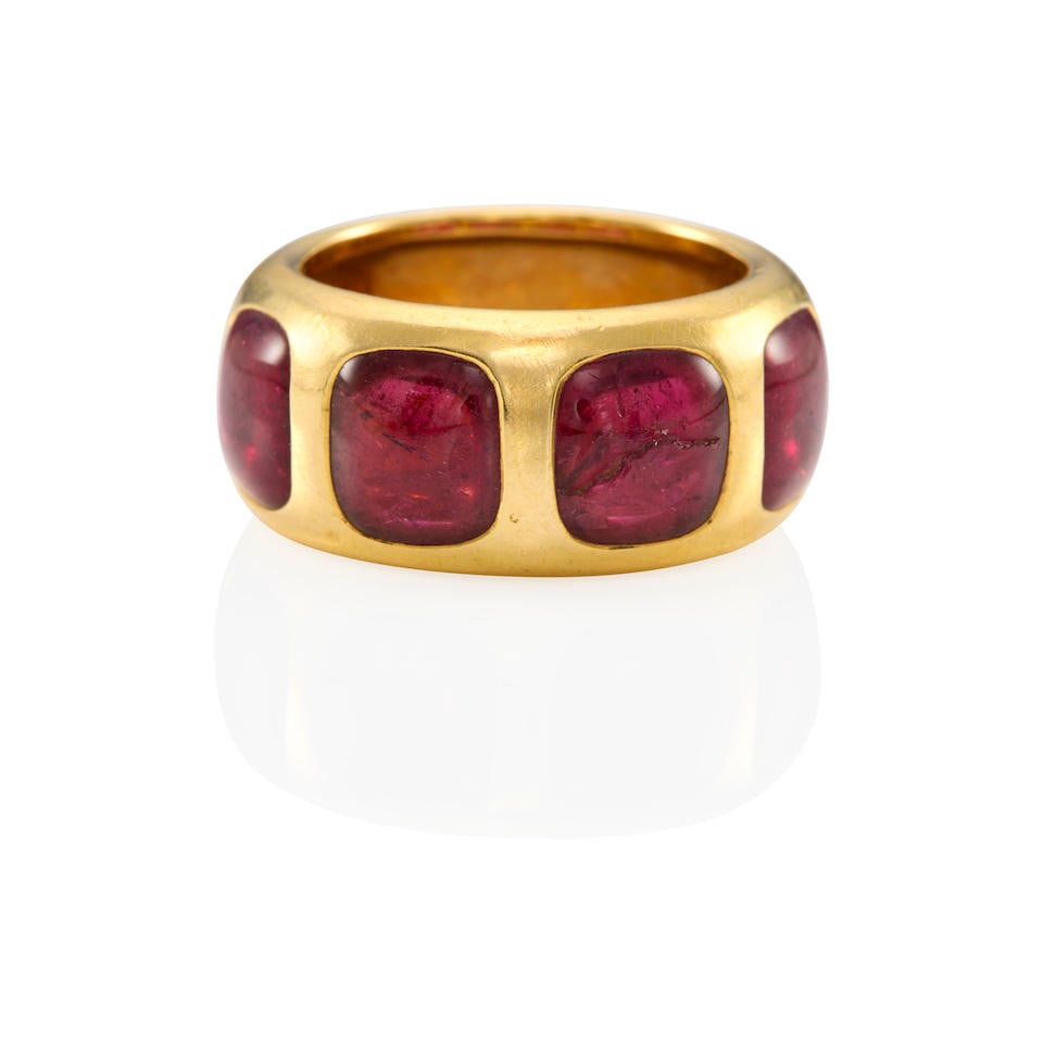 POMELLATO: 18K GOLD AND TOURMALINE RING: POMELLATO: 18K GOLD AND TOURMALINE RING • 18k yellow gold • 4 square-shaped tourmaline cabochons weighing approximately 6.40 - 6.60 carats total • Signed 'Pomellato' and numbered 
